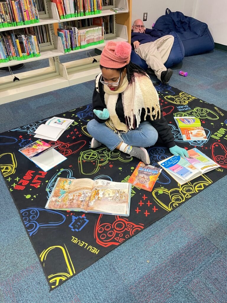 Participant reading books Pinellas Park Library